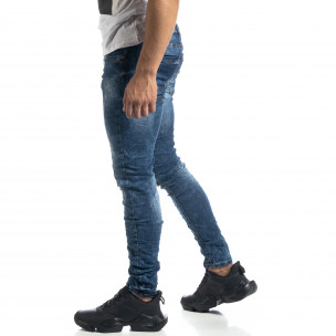 Blugi de bărbați albaștri cu efect decolorat Slim fit - FASHIONMIX.RO Blugi de bărbați albaștri cu efect decolorat Slim fit