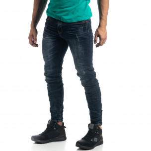 Blugi de bărbați în albastru închis cu accente Slim fit - FASHIONMIX.RO Blugi de bărbați în albastru închis cu accente Slim fit