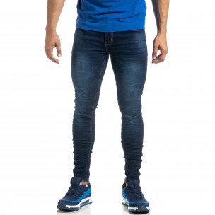 Blugi de bărbați în culoarea indigo cu efect șifonat Skinny fit - FASHIONMIX.RO Blugi de bărbați în culoarea indigo cu efect șifonat Skinny fit