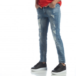 Blugi de bărbați albaștri cu rupturi decorative - FASHIONMIX.RO Blugi de bărbați albaștri cu rupturi decorative