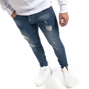 Blugi de bărbați albaștri Slim fit cu rupturi decorative - FASHIONMIX.RO Blugi de bărbați albaștri Slim fit cu rupturi decorative