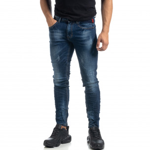Blugi de bărbați albaștri cu efect decolorat și rupturi Slim fit - FASHIONMIX.RO Blugi de bărbați albaștri cu efect decolorat și rupturi Slim fit