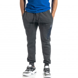 Pantaloni de trening de bărbați flaușați melanj gri - FASHIONMIX.RO Pantaloni de trening de bărbați flaușați melanj gri